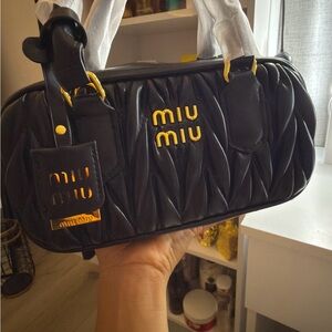 Black Matelassé Leather Top-Handle Bag